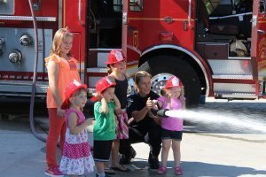 Fire Prevention Week Kids with Fire Fighter