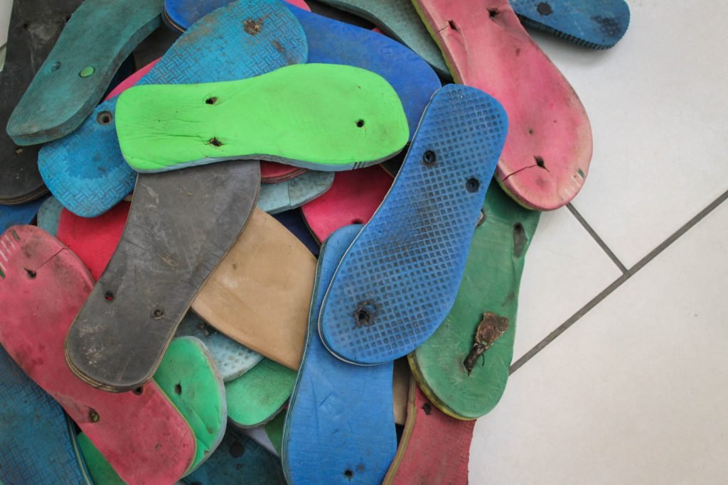 Discarded Flip Flop Pile Waste To Wonder