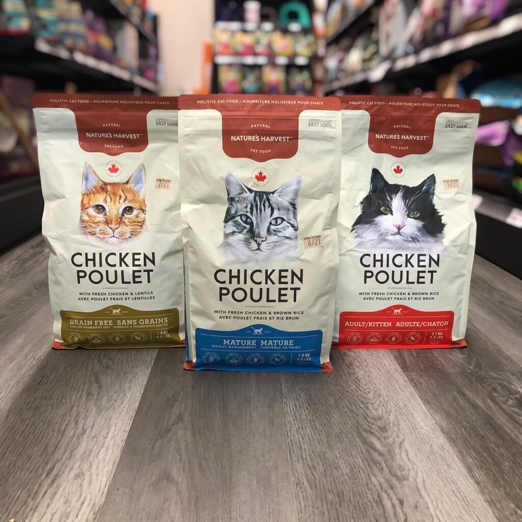 Close up of Nature's Harvest Cat Food assortments in dry bags