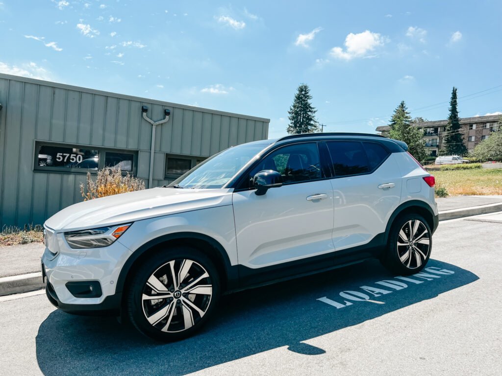Volvo XC40 Recharge white SUV parked in a parking lot